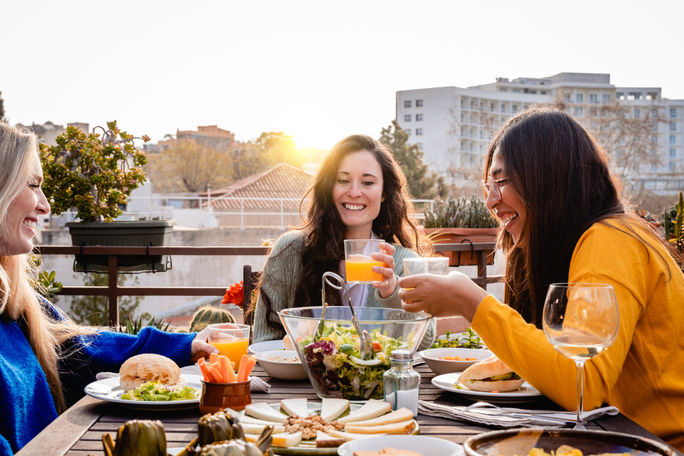 A group of friends eating a vegan meal