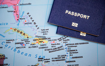 Passports on a map of the Caribbean region.
