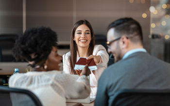 Travel agent serving clients.