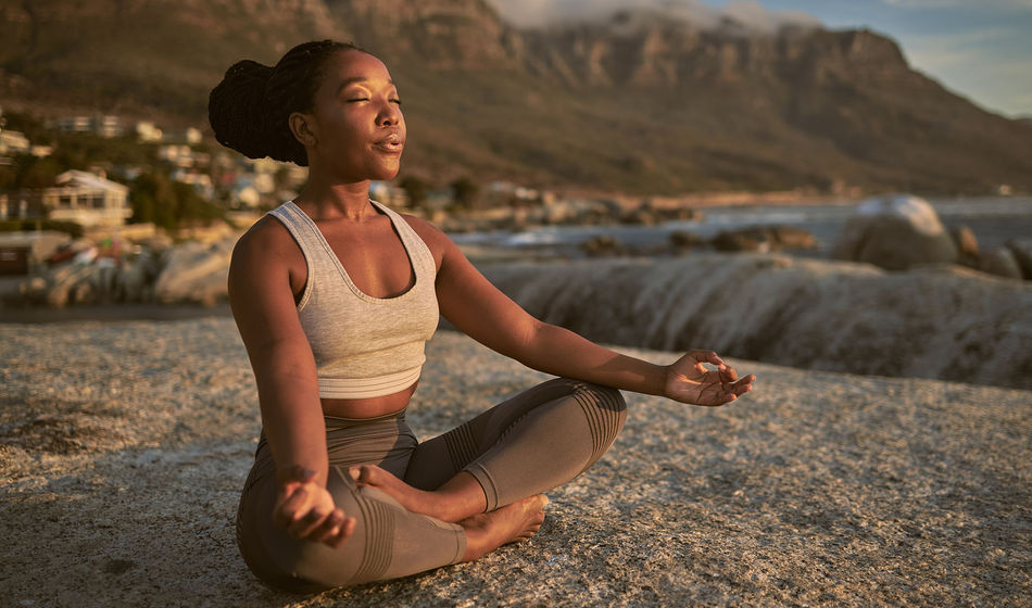 Woman practicing yoga on a Goway Ultimate Wellness vacation.