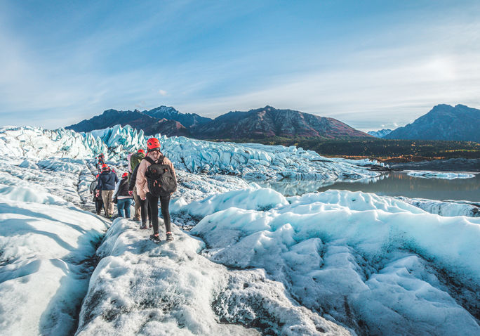 Group hiking the Matanuska Glacier in Alaska.
