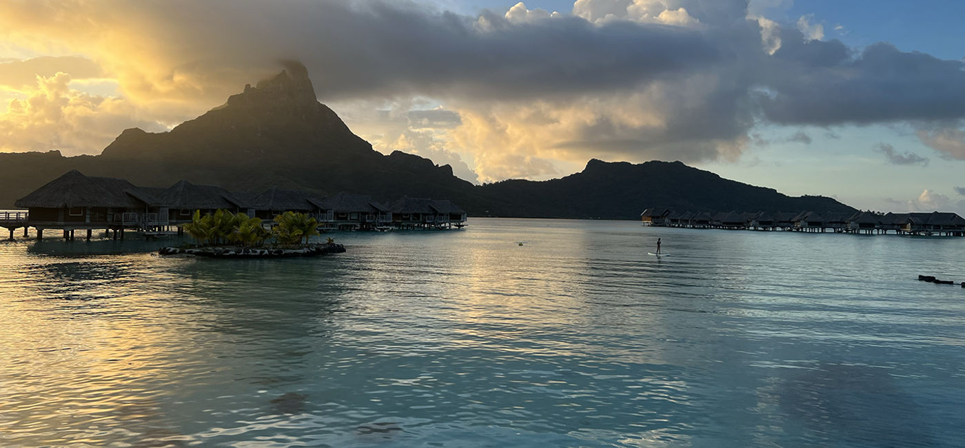 Image: Bora Bora's lagoon at sunset. Photo by Paul Heney. (Photo Credit: Photo by Paul Heney.)