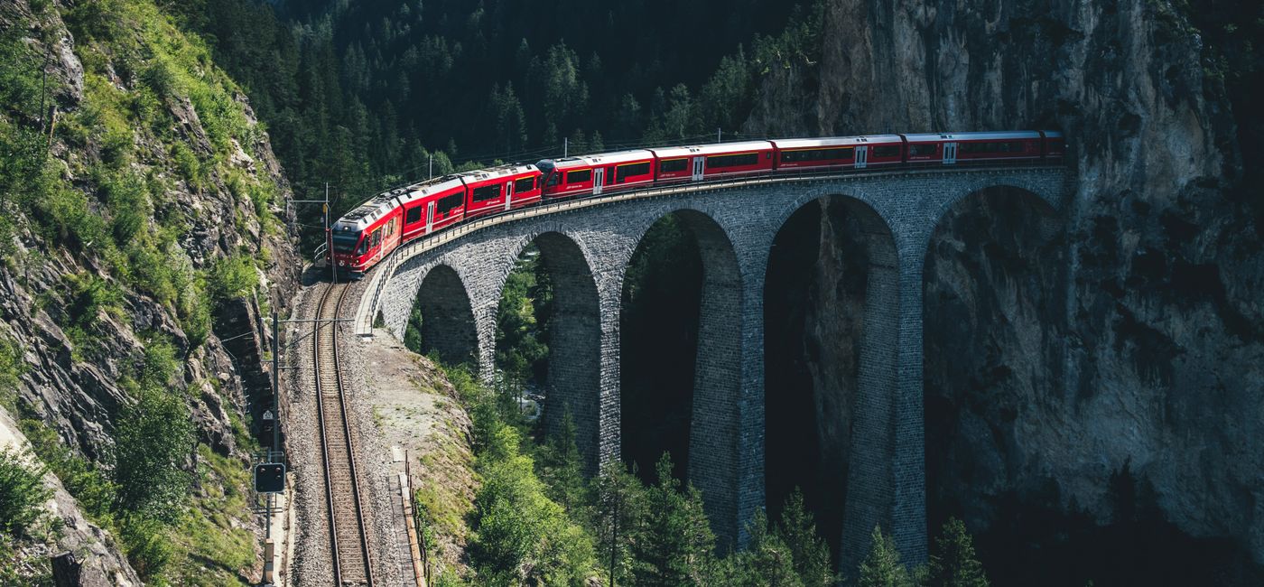 Image: Rail Europe train traveling through the mountains. (Photo Credit: Rail Europe/Nicolas Hans)