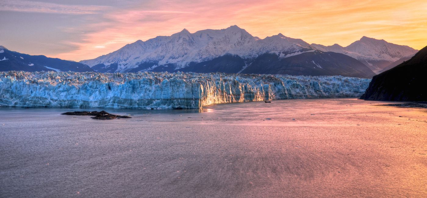 Image: Sunrise at Hubbard Glacier, Alaska. (Photo Credit: Adobe Stock/lhboucault)