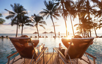 Sitting poolside on a luxury vacation