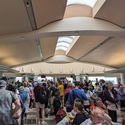 Airport crowd, people, travelers, travel, traveling, crowds, gate, gate lice,