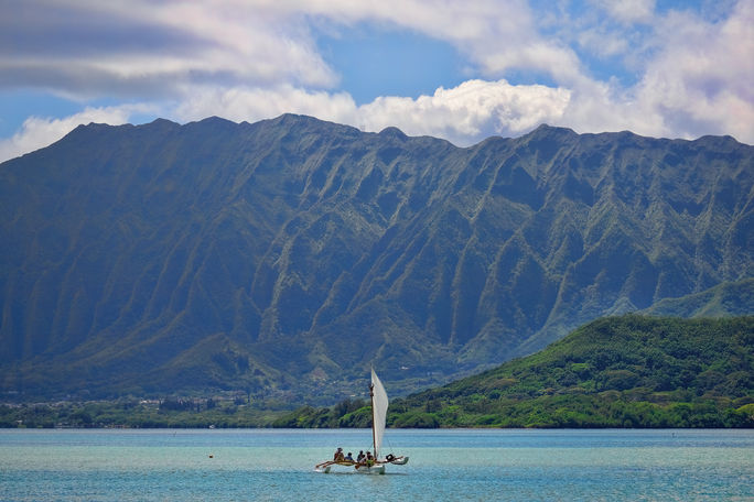 Outrigger canoe sailing in Kaneohe Bay, Oahu, Hawaii.