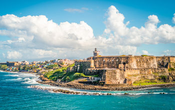 Panoramic landscape of historical castle El Morro along the coastline, San Juan, Puerto Rico.