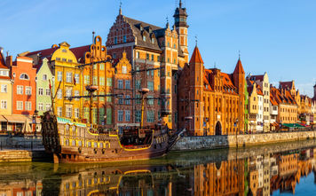 The riverside with the characteristic promenade of Gdansk, Poland. (Photo via nightman1965 / iStock / Getty Images Plus)