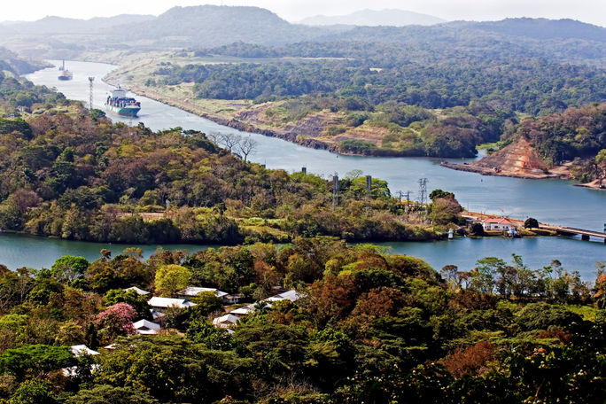 Ships navigate the Panama Canal.