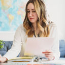 A travel advisor working on her computer.