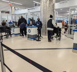 TSA security line, travel, travelers, crowd, wheelchair,